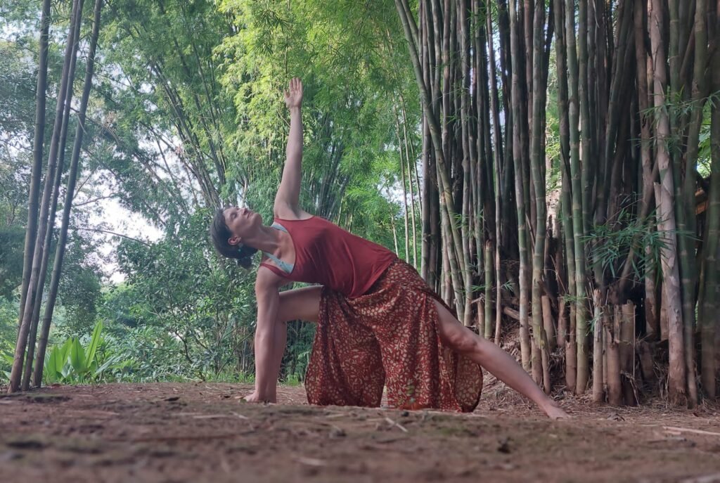 Woman dancing in the nature of Luang Prabang